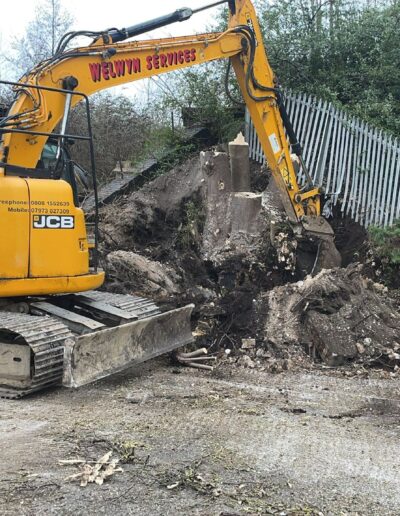 Bulldozer Tree Removal Tree Pollarding background for Everest Tree Services in Hertford & Bedfordshire